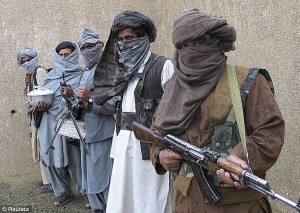 According to the FBI, this is a photo of the Russian Taliban leader with some of his Taliban unit.