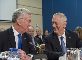 Defense Secretary Jim Mattis talks with Britain's Defense Secretary Michael Fallon during a North Atlantic Council meeting at NATO headquarters in Brussels, Feb. 15, 2017. (DoD photo by Air Force Tech. Sgt. Brigitte N. Brantley)