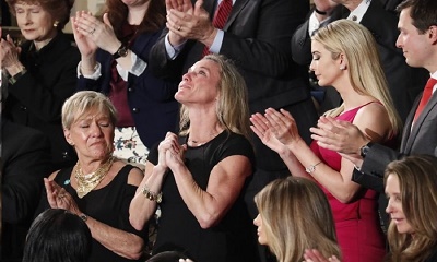 The wife and family of fallen Navy SEAL William "Ryan" Owens were given a standing ovation as they sat with the Trump family during Tuesday night's speech.