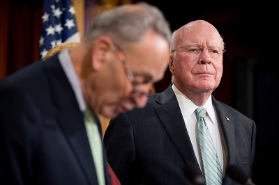 Sen. Charles Schumer, D-N.Y., left, and Sen. Patrick Leahy, D-Vt., ranking member on the Senate Judiciary Committee, participate in a news conference on Capitol Hill in Washington. 