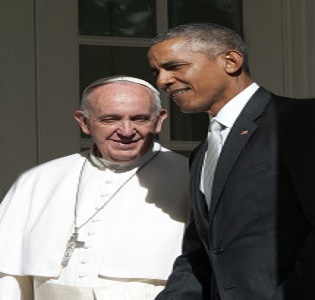 Pope Francis and President Barack Obama walk past the Rose Garden to the Oval Office. The Pope and Obama have much in common politically. 