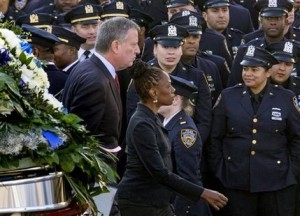 NYPD officers booed and turned their backs in a display of anger at the mayor of New York City.